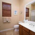 Bright and clean bathroom with a ceramic sink and stylish decor.